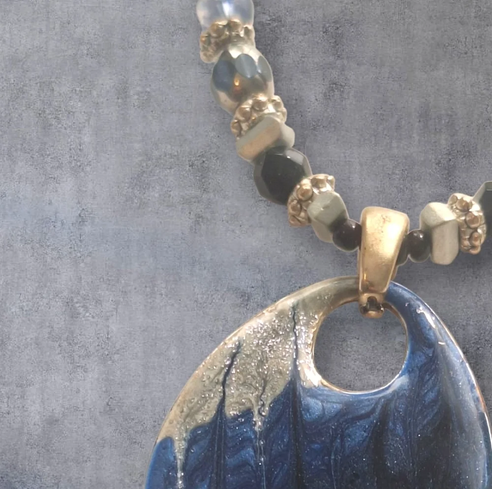Gold Silver Black and Blur Necklace with Striking Pendant